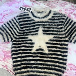 This top is from urban outfitters and very comfortable and fluffy